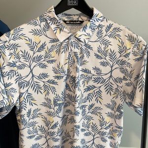 Travis Mathew polo size large